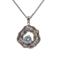 Sterling Silver and 10k Yellow Gold Rocks N Rivers Pendant with Swiss Blue Topaz and Cubic Zirconia